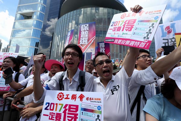 NPC says decision on HK universal suffrage to stand despite veto