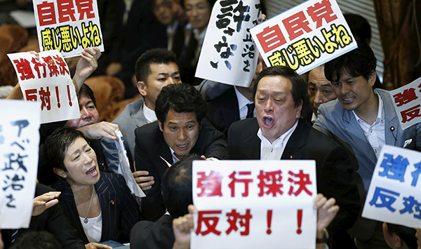 Japan's lower house passes controversial security bills