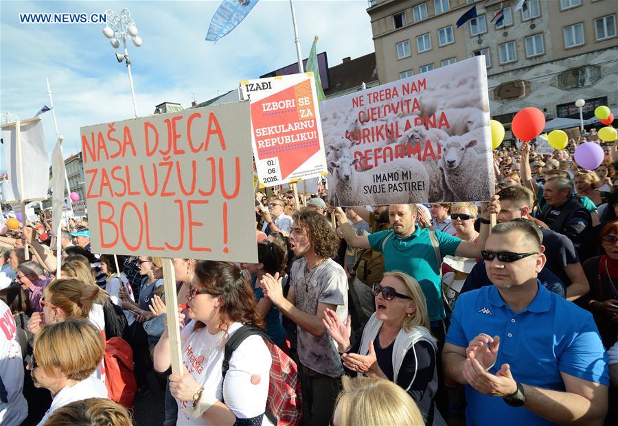 People participate in a protest to support a comprehensive curricular reform at the main square in Zagreb, capital of Croatia, June 1, 2016.